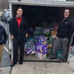 Josh, Joel, Jeff and Jon with 25,104 diapers