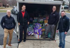 Josh, Joel, Jeff and Jon with 25,104 diapers